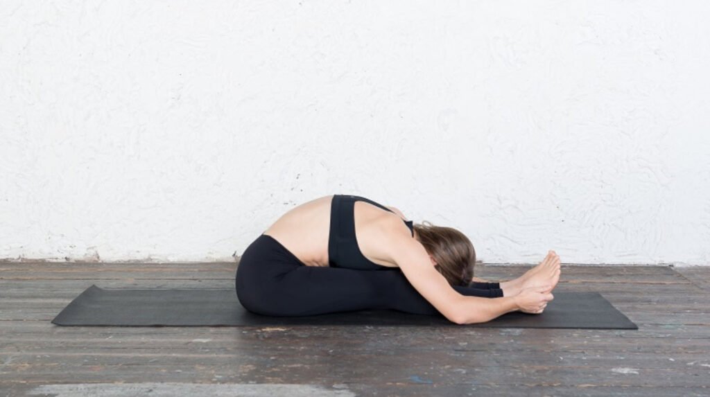 Seated Forward Fold Yoga pose Healthhyme